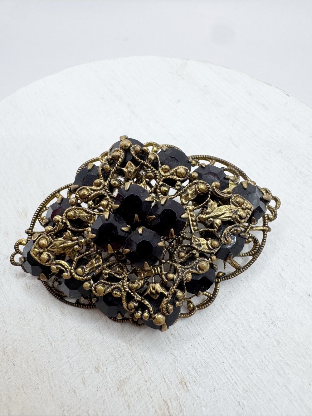 Antiqued gold tone filigree Czech style glass brooch pin